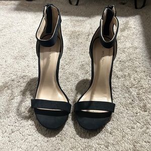 Size 7 1/2 black stilettos.